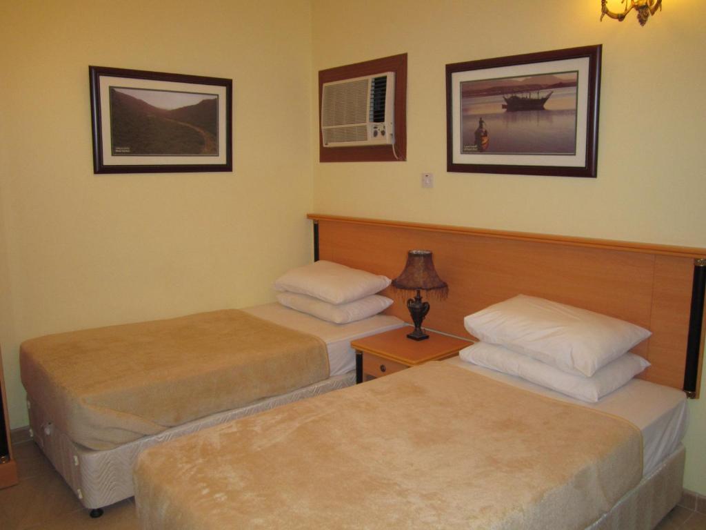 Muscat International Hotel Szoba fotó